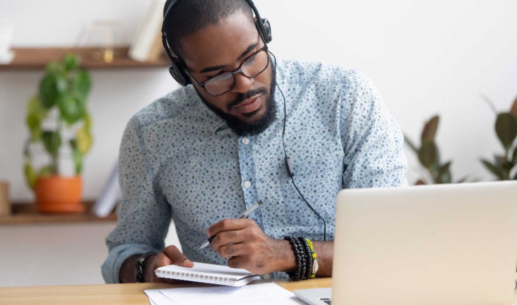 man studying holistic nutrition and health coach program