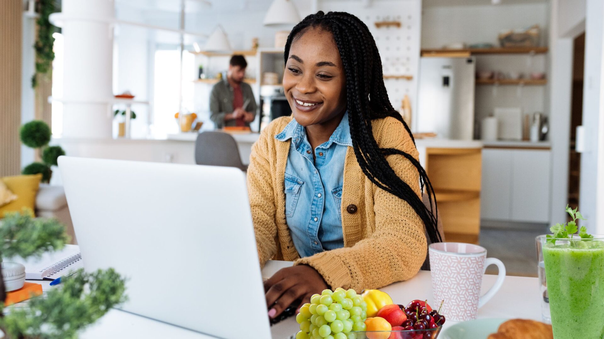 woman kitchen computer fruit