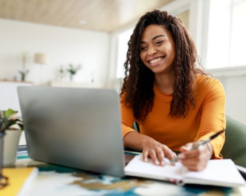 woman smiling computer